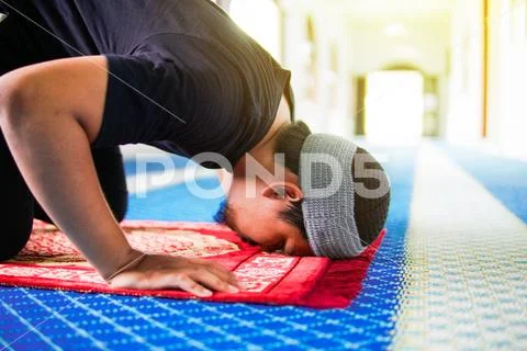 Close up of religious muslim man praying Stock Photos