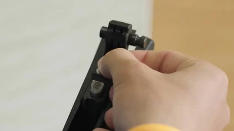 Close-up of reloading airsoft gun Stock Footage 161018259