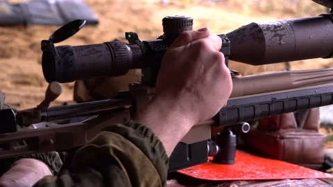 Close-up reloading of a sniper rifle Stock Footage 228053693