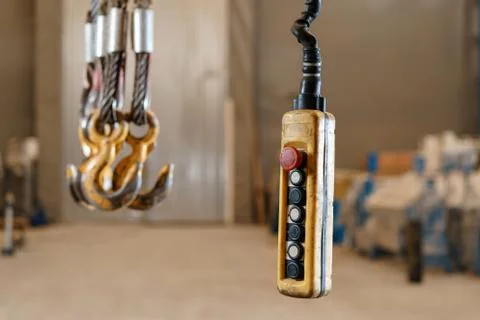 Close up remote control switch for overhead crane in manufacture workshop Stock Photos