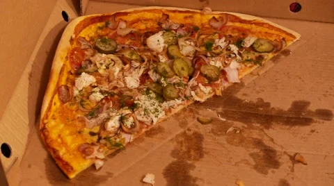 Close up removing a delicious slice of pizza. 4K UHD Stock Footage 65146256