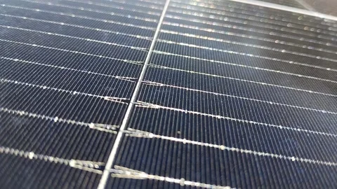 Close-up of renewable energy solar panel surface showing intricate grid lines Stock-Footage 333984938
