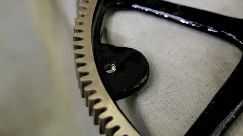 Close-Up of Repaired Cast Iron Clock Gear Wheel 库存影片 345752472