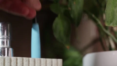 Close up of replacing old worn out toothbrush with new one Stock-Footage 344876991