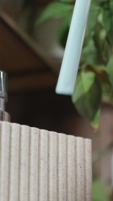 Close up of replacing old worn out toothbrush with new one Stock-Footage 344877011