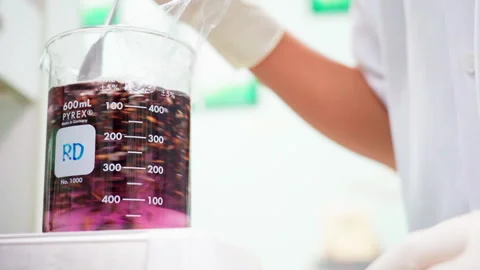 Close up researcher using laboratory stirrer Rice solution in beaker 100fps Stock-Footage 156242252