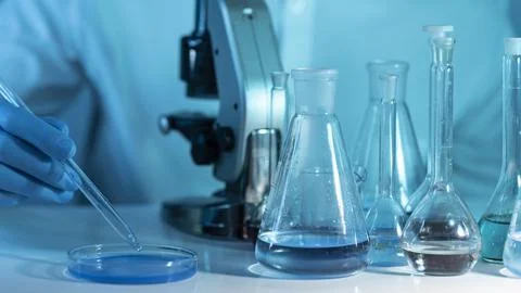 Close up researcher working with microscope Beautiful photo Stock Photos