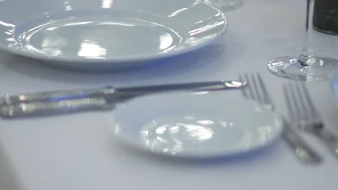 Close-up restaurant serving. Restaurant interior - empty glasses on table. Video stock 88784753