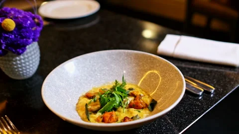 Close up of a restaurant table with a pull out motion Stock Footage 240917428