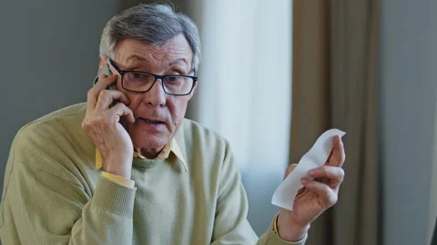 Close up retired customer complaining high price talking on phone portrait 스톡 동영상 170723903