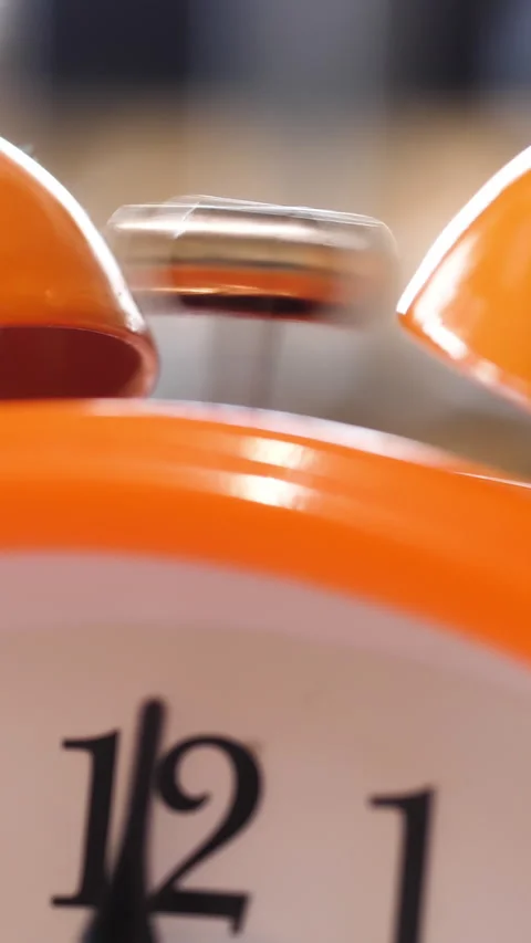 Close up of retro alarm clock going off on blurred background. Stock fooatge Stock Footage 285921102