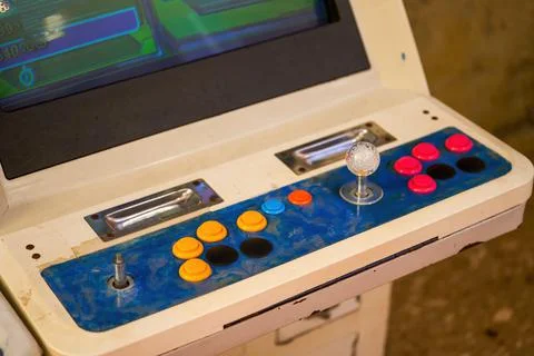 Close-up of a retro gaming arcade console Stock Photos