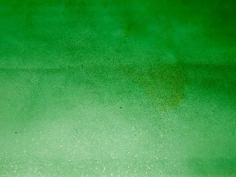Close up of retro green surface rough stained Stock Photos