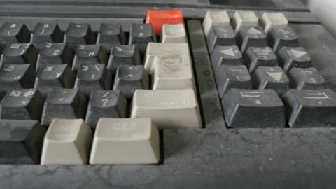 Close-up on retro keyboard is covered with dust Stock Footage 90444389
