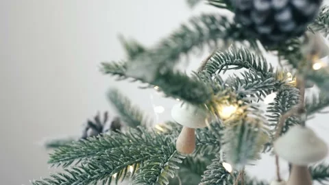 Close up of reusable minimalistic Christmas tree with wooden deco string Stock Footage 163987891