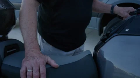 Close-up reveal of active senior citizen smiling big at the camera as he is Vidéo 333359513