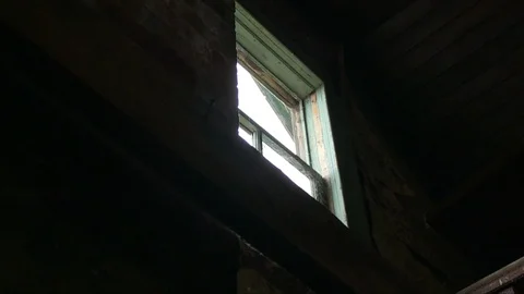 A close up reveal of an open window in an abandoned house. Stock Footage 96587767