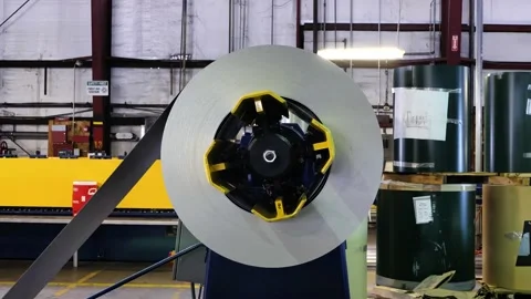 A Close up of reverse spining sheet metal spool Stock Footage 155540531