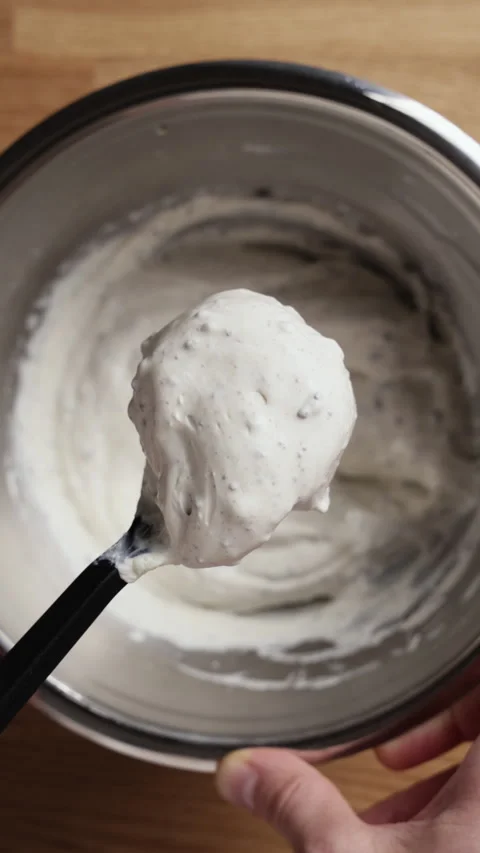 Close Up Of Ricotta And Chocolate Mixture On Spoon Top View Vídeos de archivo 334240366