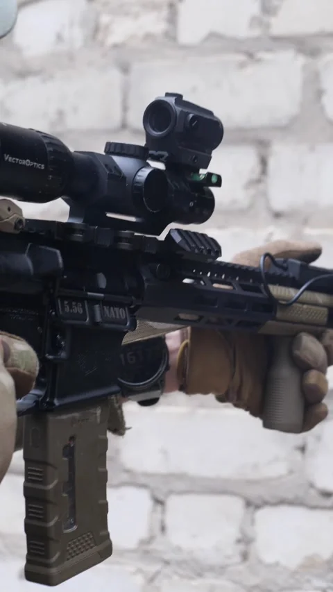 Close up of rifle barrel with muzzle flash during tactical shooting Stock Footage 333612674