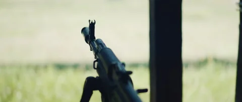 Close-up of rifle muzzle on shooting range background Stock Footage 313733831