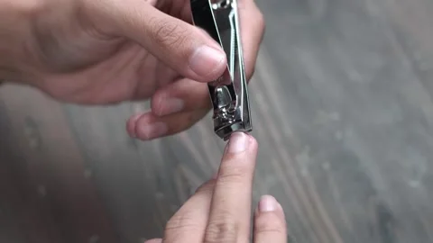 Close Up of Ring Finger Nail Clipping Stock Footage 279037189