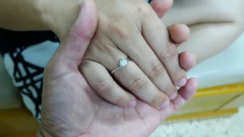 Close up on the ring hand couple. Stock Footage 79553602