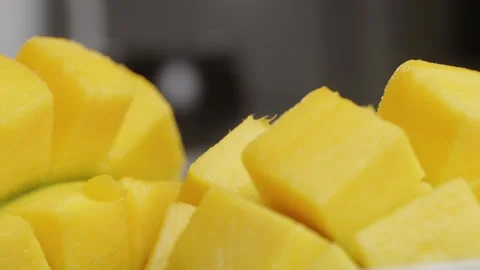 Close up rip mango slice cubes cut Stock Footage 280189999