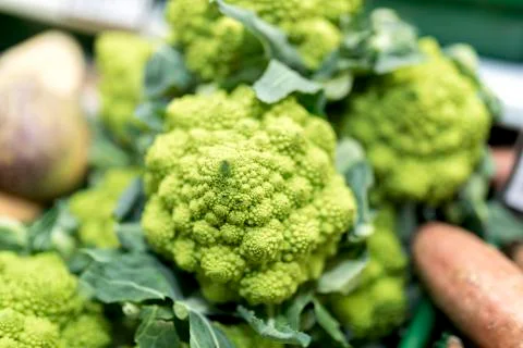 Close up of ripe and vibrant green Romanesco vegetable on a market stall Stock Photos