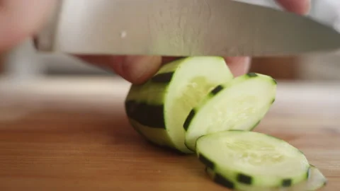 Close up of ripe cucumber sliced by chef 動画素材 153290637