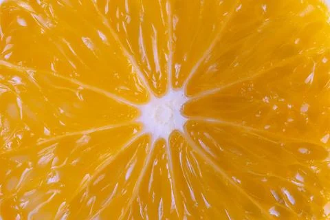 Close ripe orange segment gleaming, pastry chef prepping garnish concept, c.. Fotos de archivo
