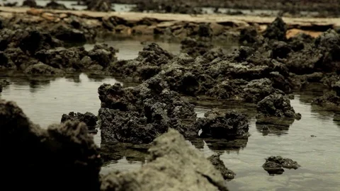 Close up of rippling water between rocks Stock-Footage 73664697