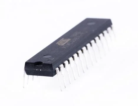 Close-up of RISC-based microcontroller chip isolated on white background. Stock Photos