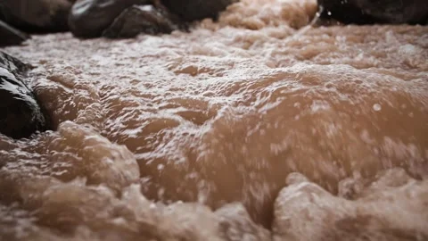 Close-up of the river flowing through the rocks Stock Footage 292592021