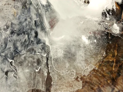 Close up of a River Flowing under Ice Stock Footage 73545535