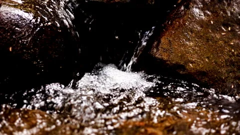 Close up river  mini waterfall slo mo Stock Footage 279914409