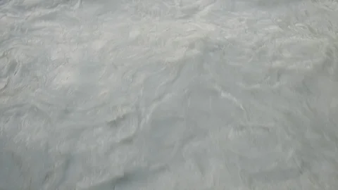 Close up of a river in the mountain, water flowing. Video stock 115825480