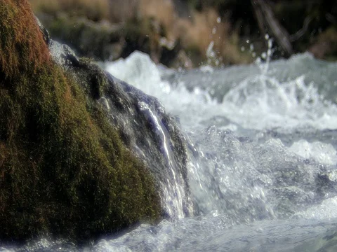 Close up of River Rock- Slow Motion Tumultuous Water Stock Footage 82361085