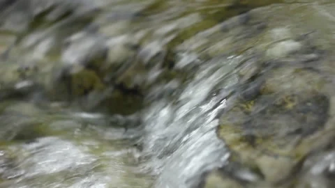 Close up river stream surface. Stones under water.  Stock Footage 130857516