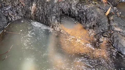 Close up of river water flow between stones Stock Footage 287824290