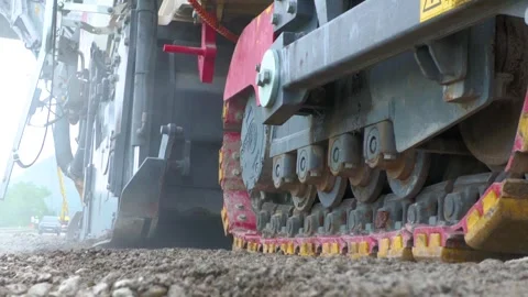 Close-Up of Road Milling Machine Removing Asphalt Stock Footage 344332683