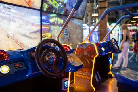 Close up of off road racing arcade game machine. Toronto, Canada - June 25, 2026 Stock-Fotos