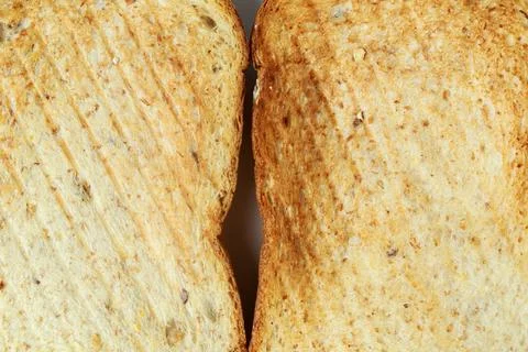 Close up roasted bread background texture. Macro photo top view. Foto stock