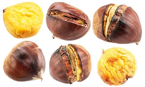Close-up of roasted chestnuts with yellow sponge cake Stock Photos