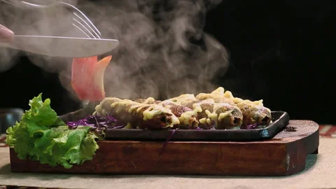 Close-Up Roasted Chicken BBQ Kebab with Male Hand Knife Cutting Black Background Stock Footage 200953736