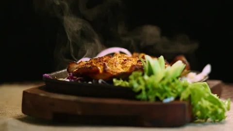 Close-Up Roasted Chicken BBQ With Smoke Black Background Stock Footage 200954321