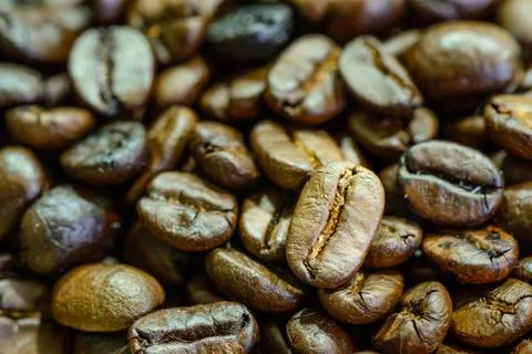 Close up of  roasted coffee bean. Stock Photos