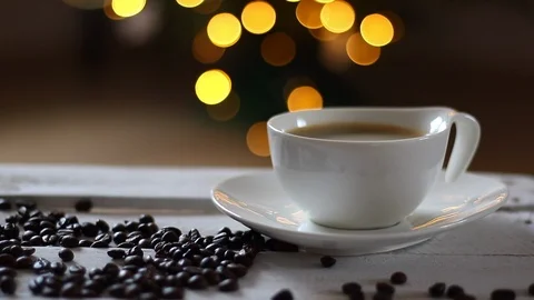 Close Up Of Roasted Coffee Beans And Cup Of Coffee With Smoke. Stock Footage 100515068