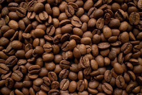 Close-up roasted coffee beans. Background. Foto stock