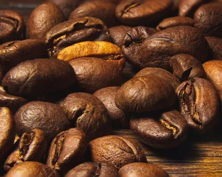 Close-up of roasted coffee beans with rich texture Stock Photos